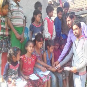 शहादत पर गरीबों में की गई शिक्षण सामग्री वितरण